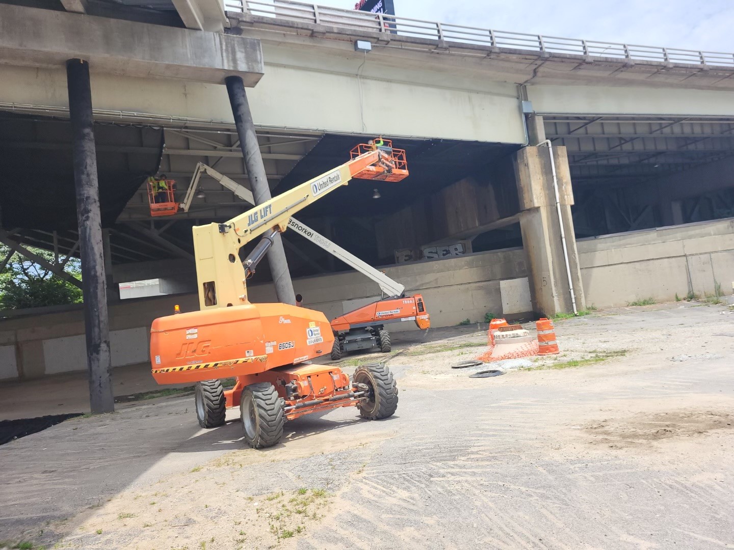 Installing netting under bridge to protect GWCC Station Roof